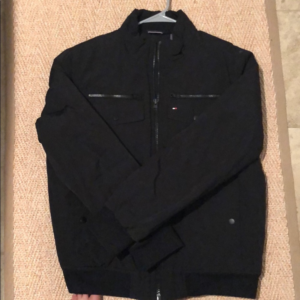 Tommy Hilfiger puffy coat with multiple pockets.